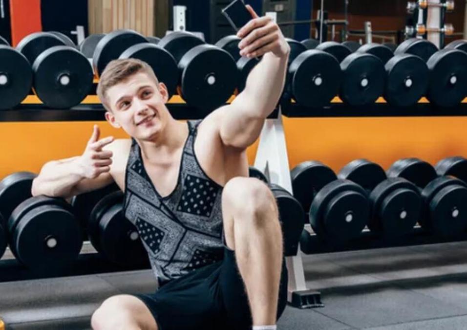Man taking a photo at the gym