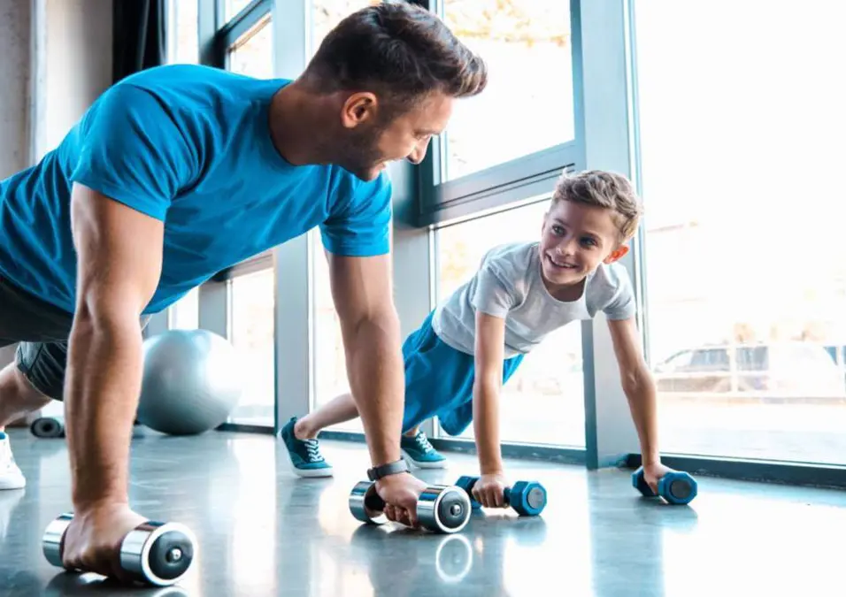 Man and his son exercising