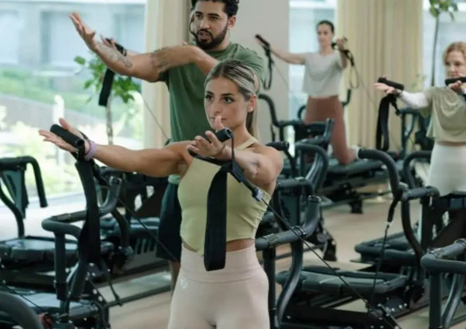 Girl and man exercising