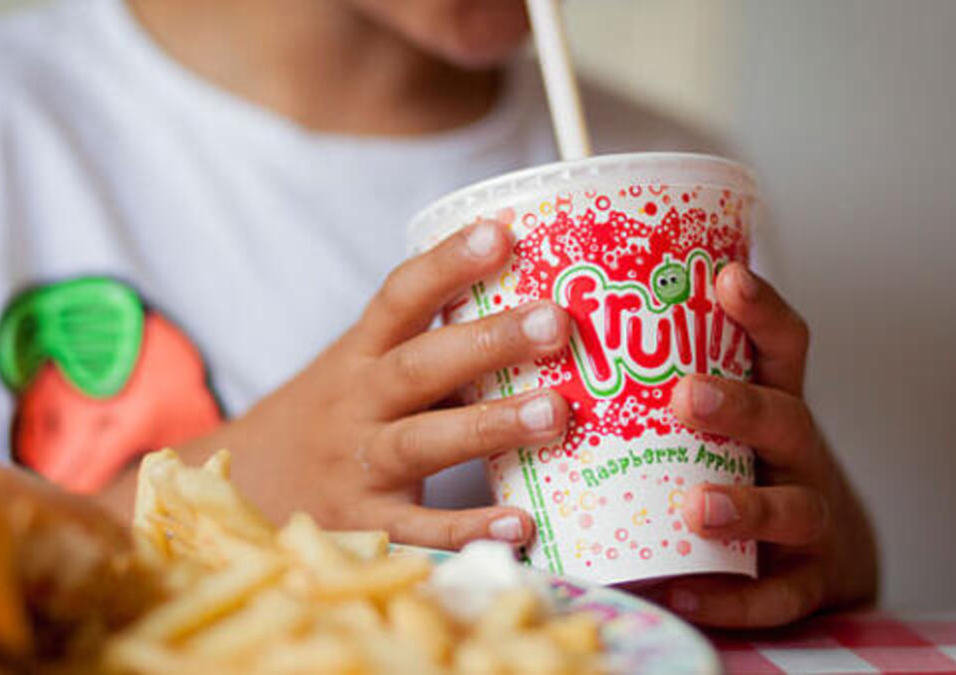 A person eats fast food