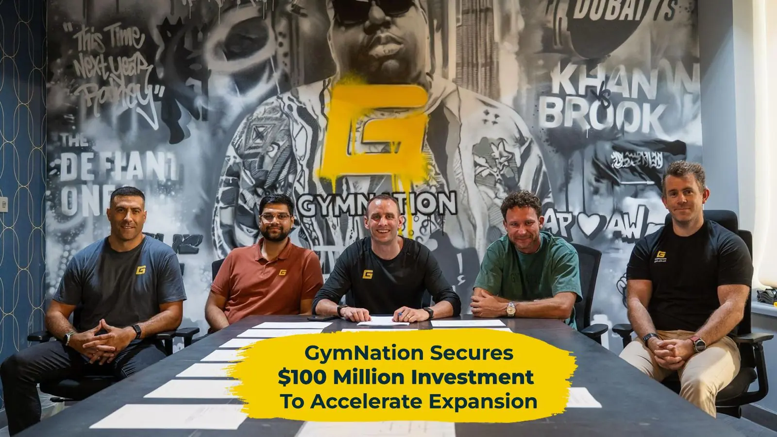 Management team at GymNation announcing a $100 million investment to accelerate expansion.
