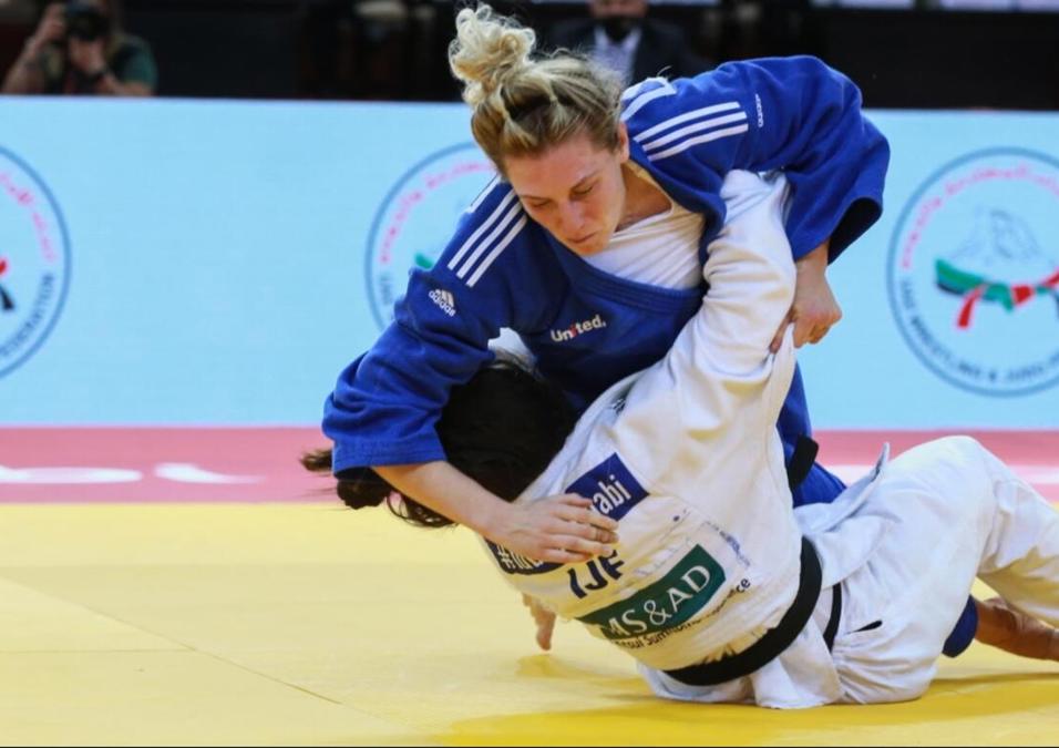Two girls practicing judo