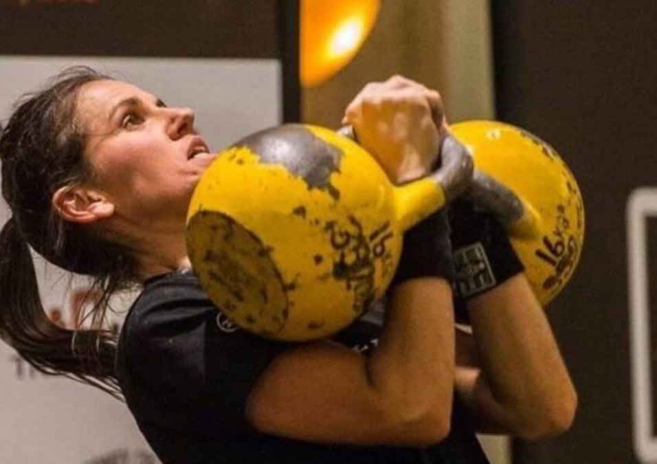 Girl carrying weights