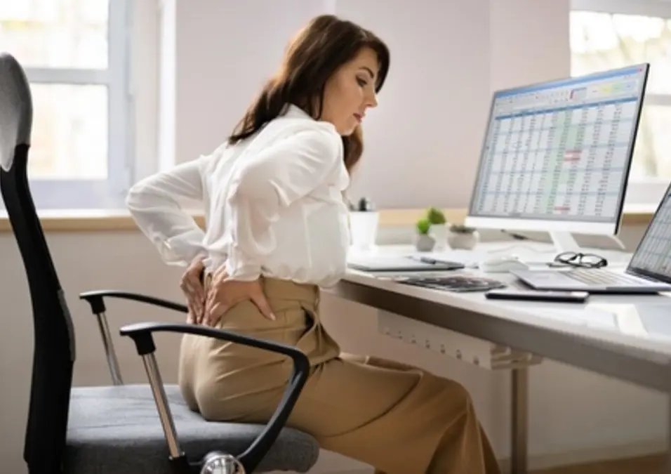 girl sitting in front of her desk