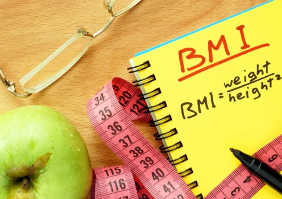 BMI formula in yellow page with green apple