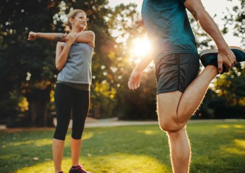 Girl and man exercising