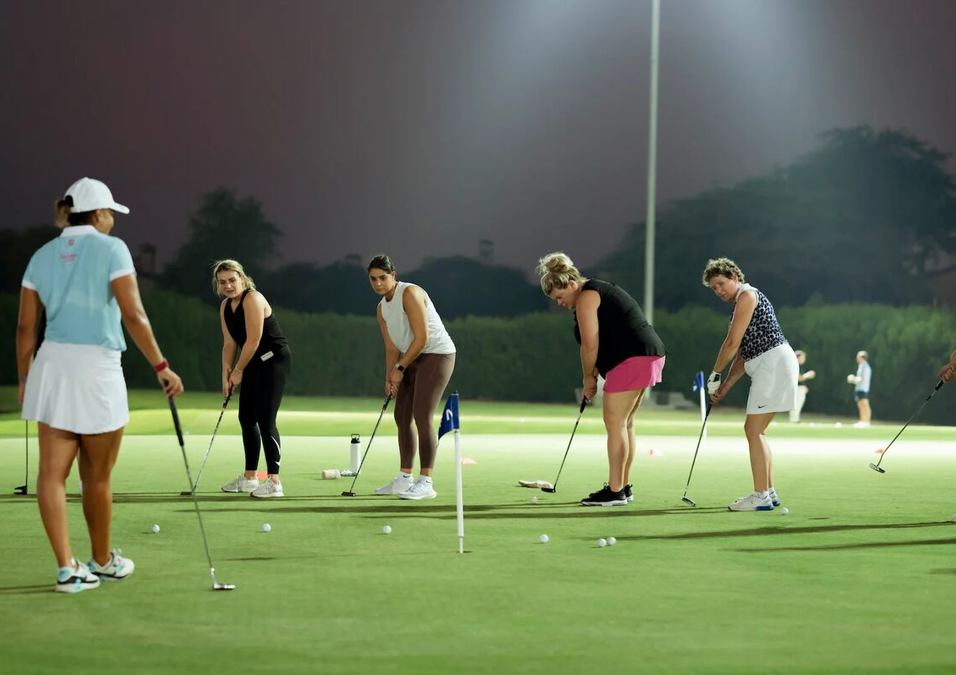 Girls playing golf