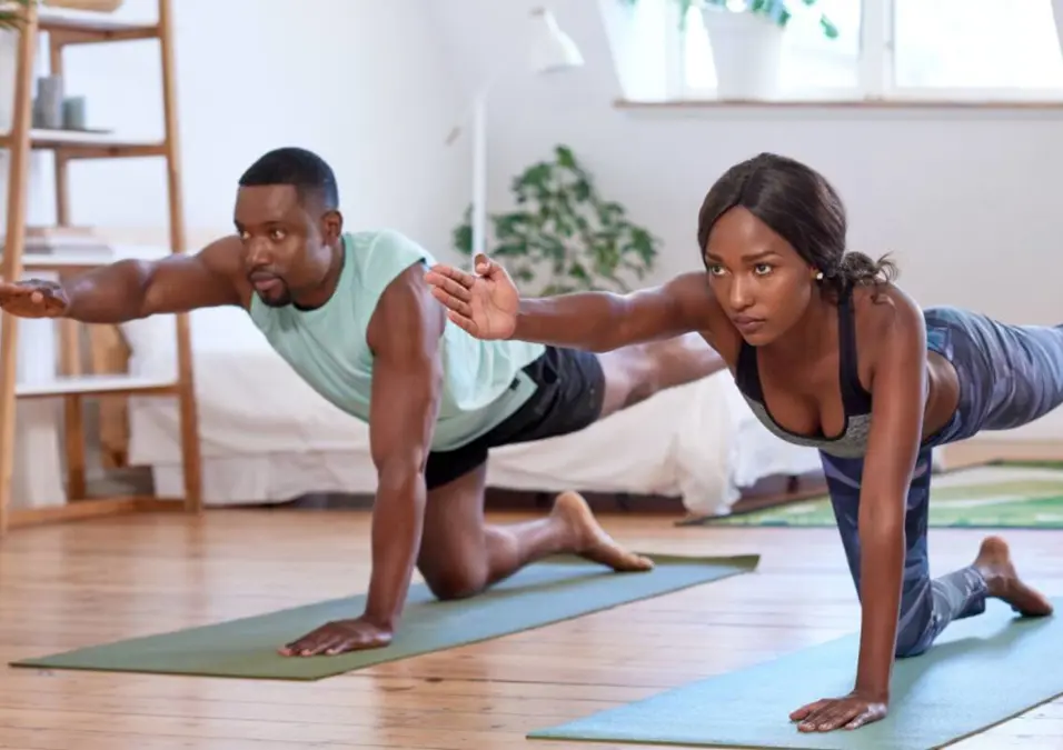 Girl and man exercising
