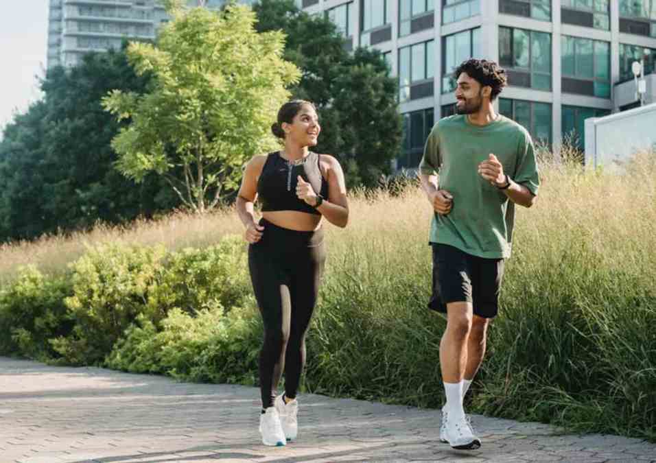 A young man and a girl running