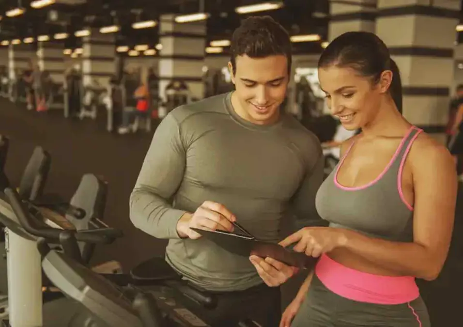 Girl and boy looking at tablet