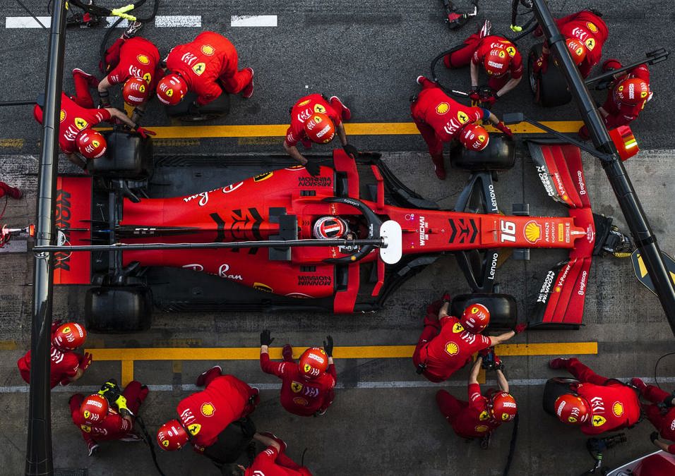 red F1 car with Driver and team