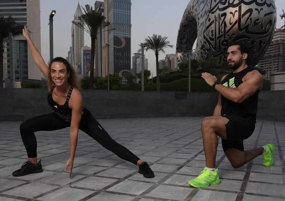 Girl & man exercising
