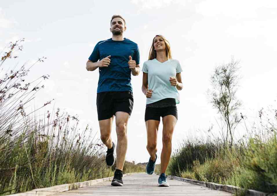 Girl and man running