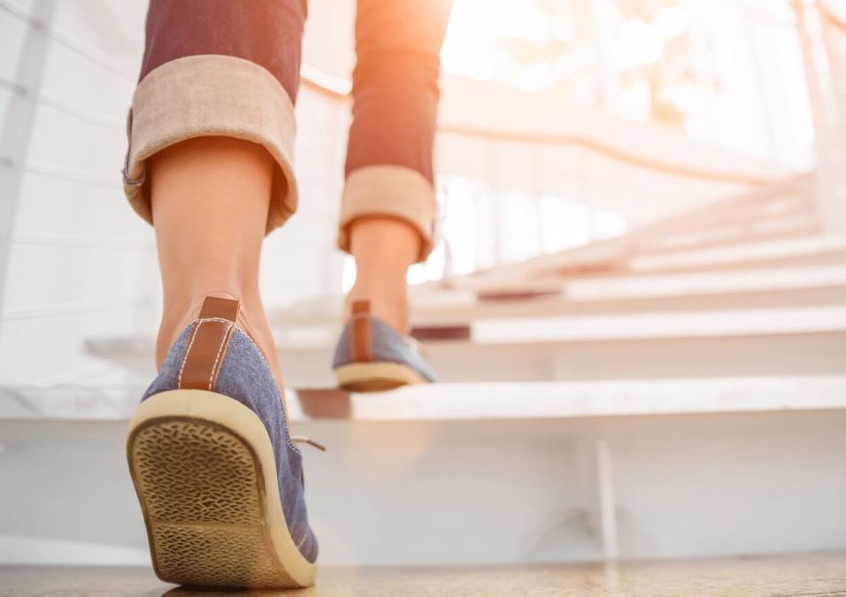 Feet walking up the stairs